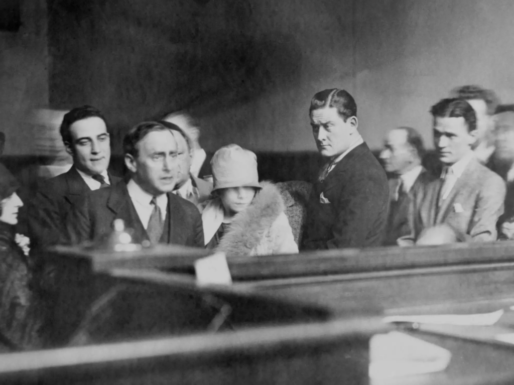 West in court with others who were charged.