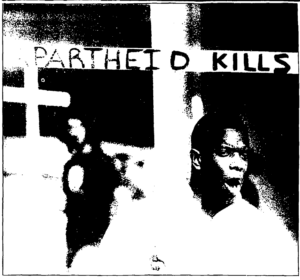 newspaper photograph of students protesting, holding sign reading "Apartheid Kills"