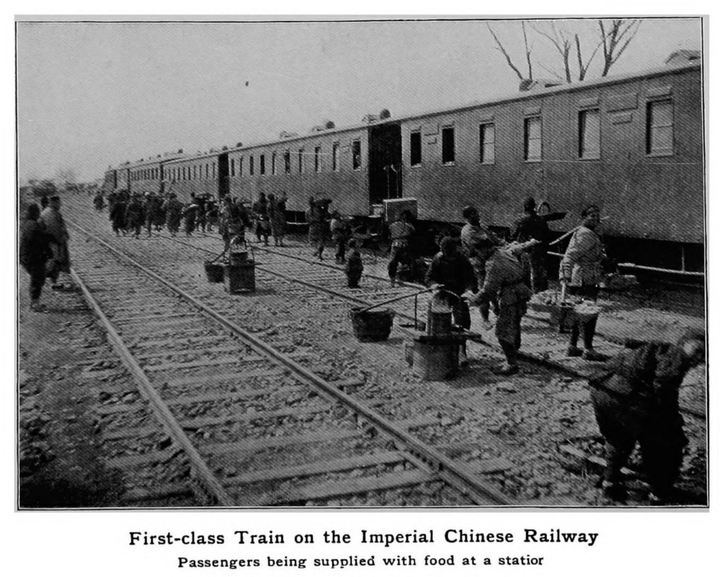 black and white photograph titled "First-class Train on the Imperial Chinese Railway: Passengers being supplied with food at a station"