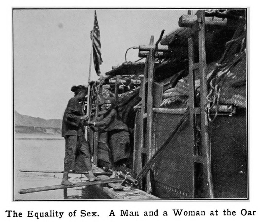black and white photograph "The Equality of Sex. A Man and a Woman at the Oar"