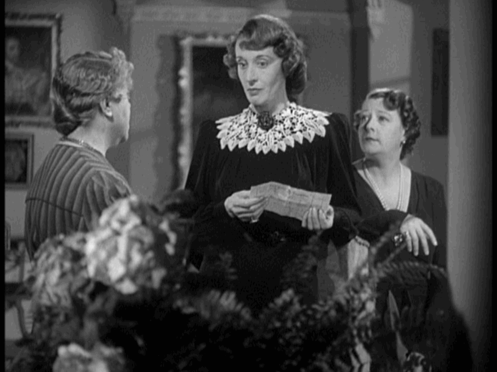 still from Went The Day Well? three middle-aged women plot how to foil their town's nazi invasion